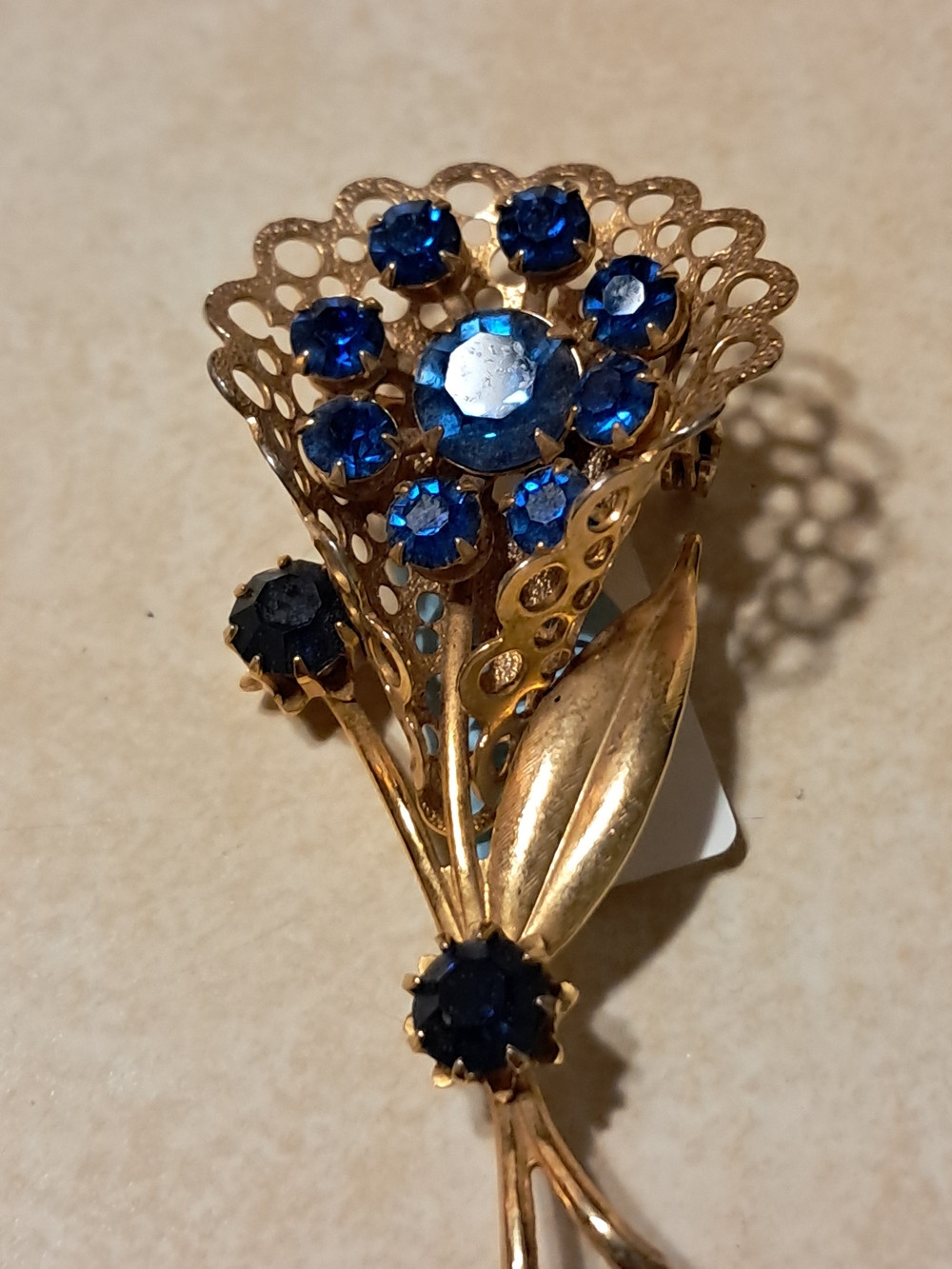 Vintage Gold-Tone Floral Brooch with Blue Rhinestones